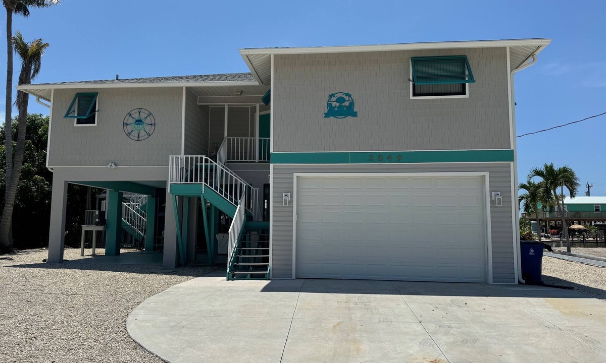 Saint James City House | Beautiful Pool home on Canal!