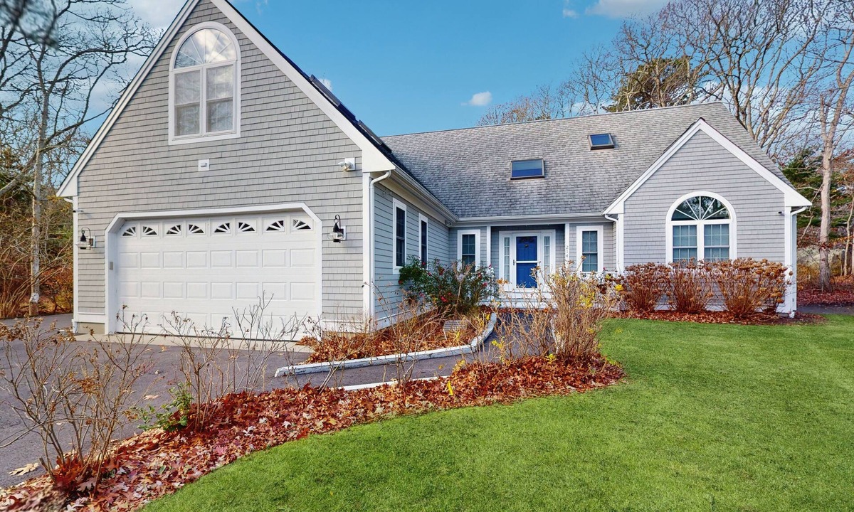 West Falmouth House | Bright coastal home close to the beach with deck, yard, AC & outdoor shower