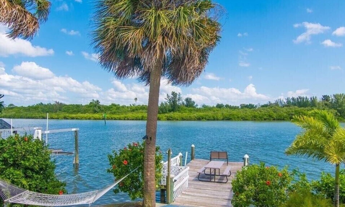 Sunset Reef Cottage | Cottage on the water! 1bd/2ba with dock by the beach