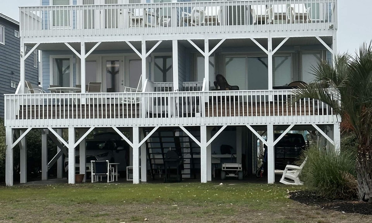 Ash House | Escape to this stunning oceanfront vacation home in Sunset Beach, NC.