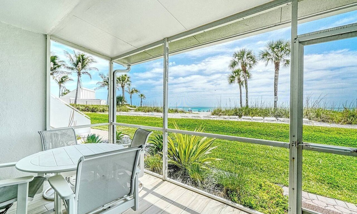 Longboat Key Apartment | LaPlaya 105B-Relax on the balcony and watch the dolphins swim by!