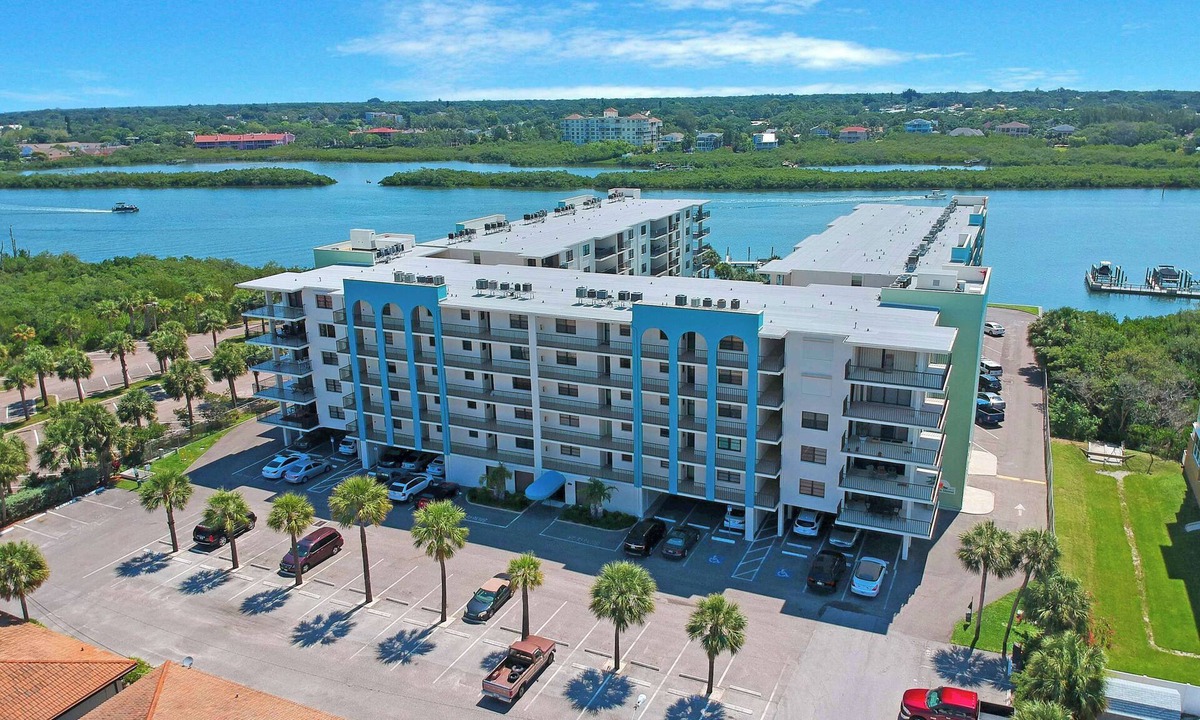 Indian Shores Condo | Light and airy condo with balcony pool hot tub and beach access