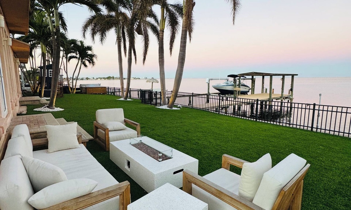 Coquina Key House | Spacious Waterfront Tropical Oasis: Hot Tub, Dock & Turf