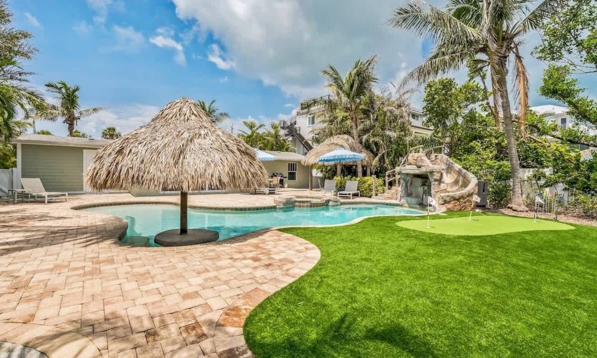 Anna Maria House | Tortuga Bay~Canal & Waterslide Putt Putt! TIKI HUT