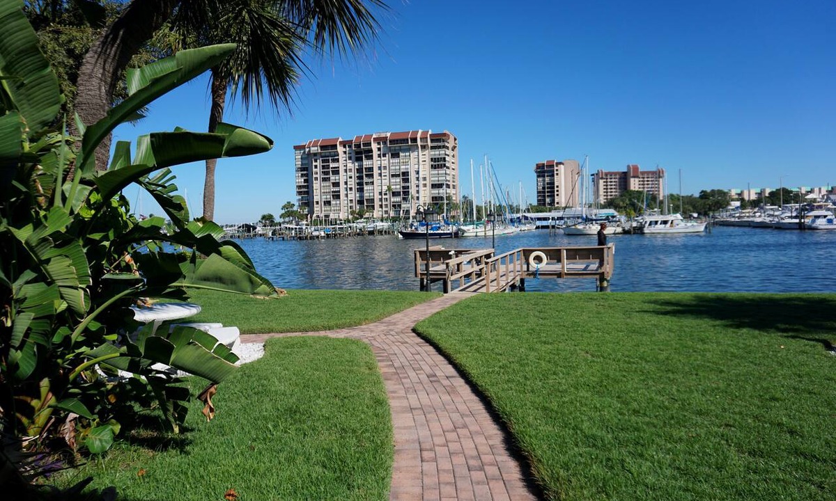 Sunset Beach Condo | Treasure Island Waterfront Condo, Equipped Fishing dock, Steps to Beach, Dining