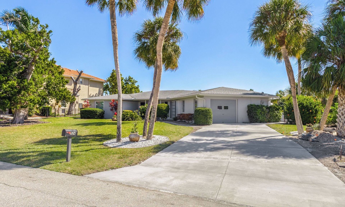 Sarasota House | Tropical Canal Home–Pool, Sun & Water Access: Paradise Cottage in LBK by RVA