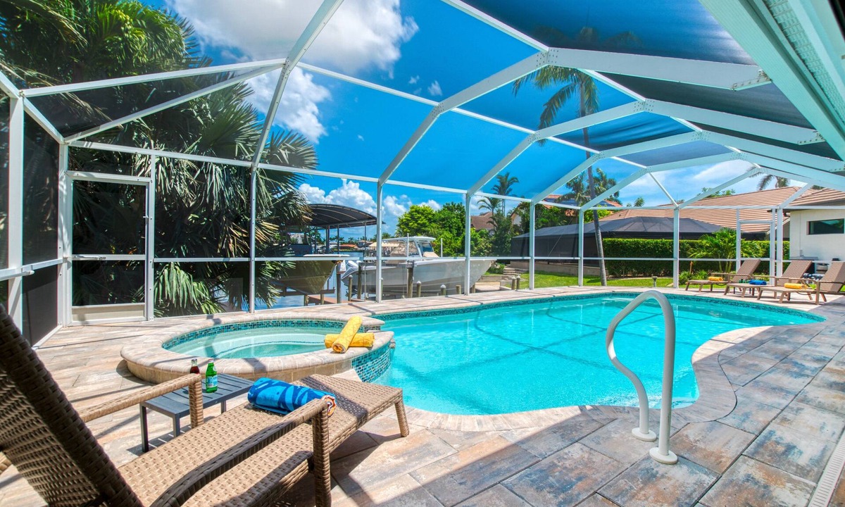 Pelican Villa | VILLA VANITY – HEATED POOL & SPA | GULF ACCESS | BOAT RENTAL + TOURS VOUCHER INCL.