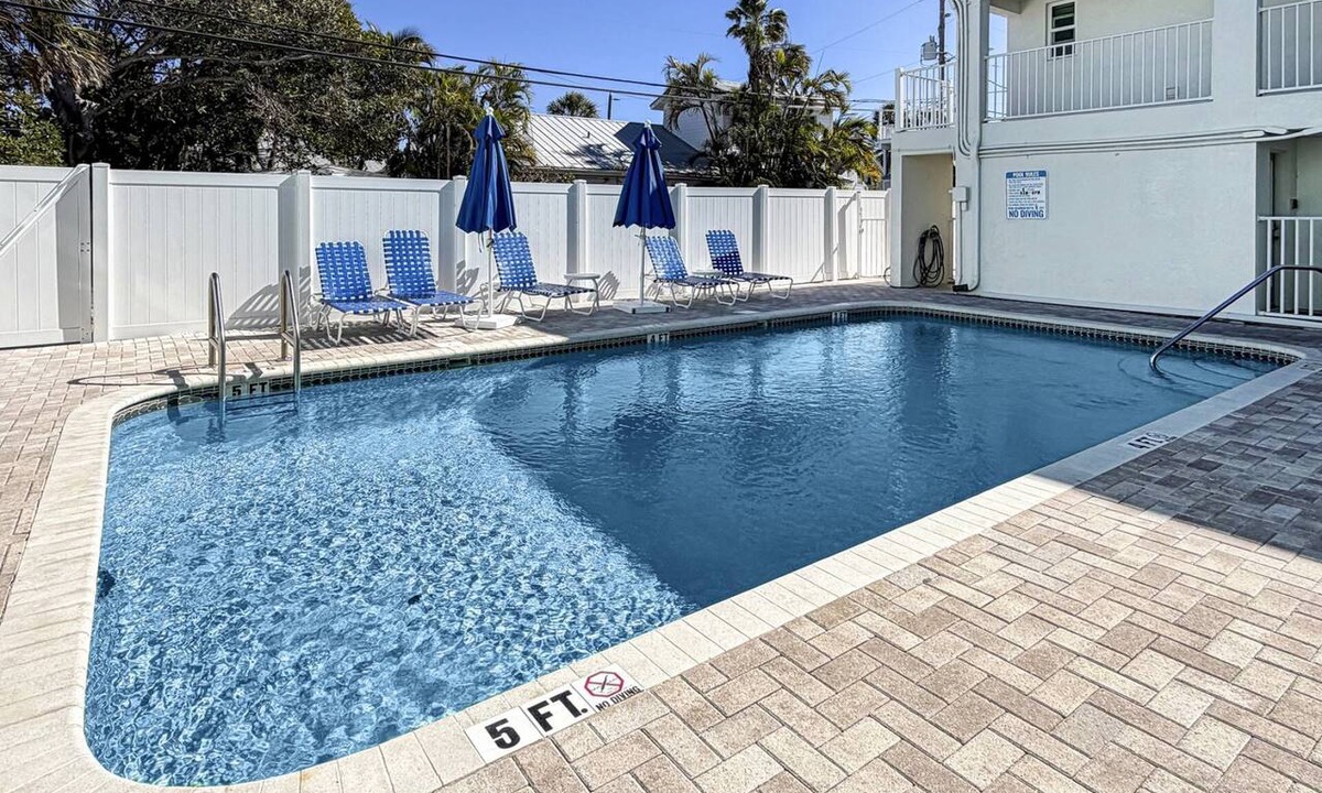 Pass-a-Grille Historic District Condo | Walk to The Best Restaurants, Beaches, and Activities. Heated Pool. Fabulous Location.