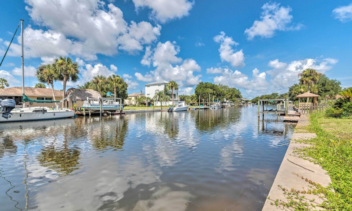 Dixie Shores House | Waterfront Home on Canal w/Dock & Pedal Boat!