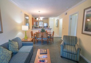 Family Group Getaway NEAR DISNEY! Three Comfy Suites, 4 Pools, Shuttle to Parks