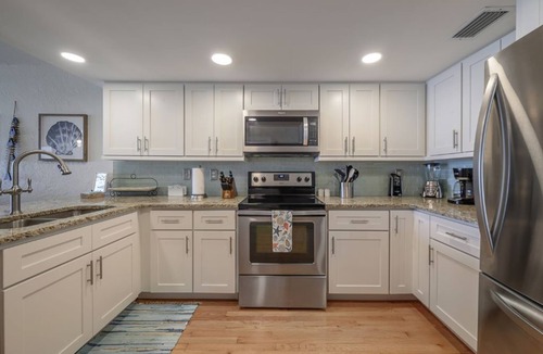 Indian Rocks Beach House | 1 step and you are on the BEACH! Watch amazing sunsets from 3 decks! PremierHost