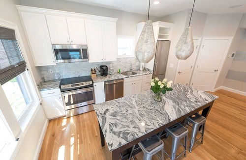 Fifth Ward Condo | 2 Decks for Entertaining, Walk To Town and Harbor
