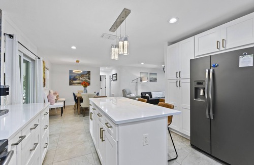 Port Tampa City House | 4 Bedroom near MacDill with a full sunroom, deck and yard