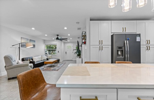 Port Tampa City House | 4 Bedroom near MacDill with a full sunroom, deck and yard