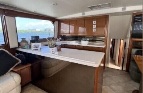 Sun Bay South Boat Rental | 48’ Hattaras Sport Yacht onTreasure Island inter coastal near johns pass village