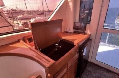 Sun Bay South Boat Rental | 48’ Hattaras Sport Yacht onTreasure Island inter coastal near johns pass village
