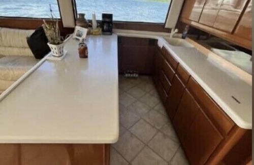 Sun Bay South Boat Rental | 48’ Hattaras Sport Yacht onTreasure Island inter coastal near johns pass village