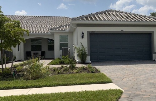 Englewood Villa | 7 minutes to Beach. Pools, pickleball, fitness center. bar and restaurant