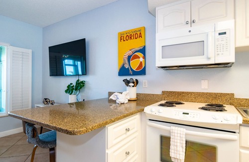 Bradenton Beach Condo | Beach House 1 Beach Front Panoramic Sunset Views Screened Lanai