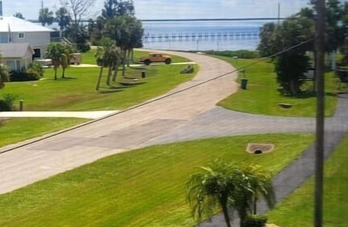 Port Charlotte Condo | Beach Retreat w/Pool & Fishing Dock