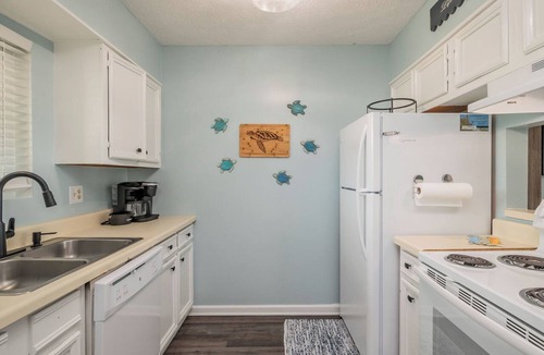 Caswell Beach Condo | Beach Therapy: Oceanfront Condo with Seasonal Community Pool