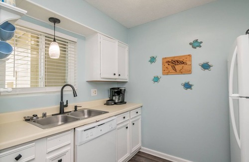 Caswell Beach Condo | Beach Therapy: Oceanfront Condo with Seasonal Community Pool