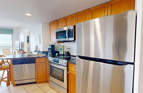 Belle Vista Condo | Beachfront 2BR at Vistas on the Gulf. Heated Pool and Hot Tub. Primary Bedroom with a Beach View.