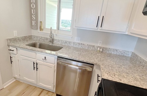 Caswell Beach Condo | BEACHFRONT:3 BR, 2 Full BA, Renovated, Beach Access , BBQ, Pool, Sleeps 9