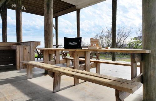 Port Bolivar House | Beachfront 4BR - Tiki Bar, Yard Games, Pet-Friendly