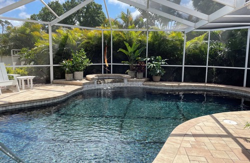 Feather Sound House | Beautiful 4-bedroom house in Clearwater with lagoon like heated pool & hot tub.