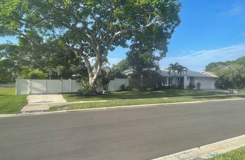 Feather Sound House | Beautiful 4-bedroom house in Clearwater with lagoon like heated pool & hot tub.