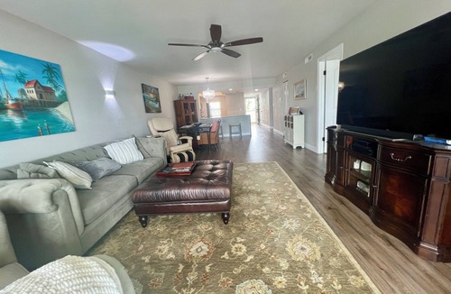 Capri Isle Apartment | Beautifully renovated waterfront owners unit!