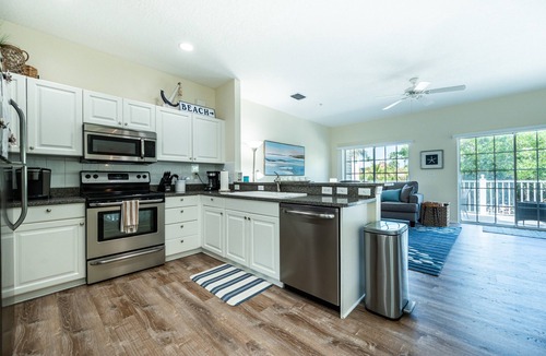 Bradenton Beach House | Bermuda Bay Club Un 26 across heated pool n spa, beach access, nicely decorated