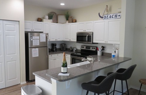 Bradenton Beach House | Bermuda Bay Club Un 26 across heated pool n spa, beach access, nicely decorated