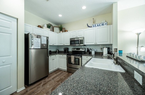 Bradenton Beach House | Bermuda Bay Club Un 26 across heated pool n spa, beach access, nicely decorated