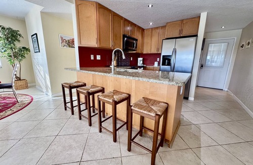 Capri Isle Condo | Canal-View Gem w/Pool in Treasure Island Paradise
