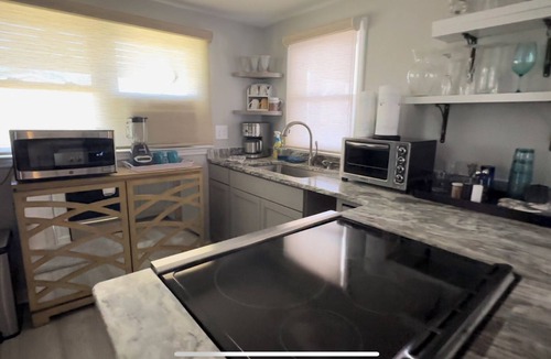 Ash Cottage | Charming 2-bedroom riverside cottage near beaches with huge bar and deck to fish