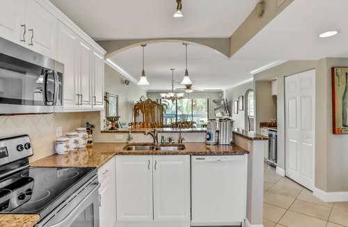 Capri Isle Condo | Chic condo near St. Petersburg w/pool & waterway views - walk to beach