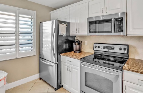 Capri Isle Condo | Chic condo near St. Petersburg w/pool & waterway views - walk to beach