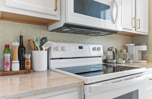 Sea Trail Condo | Coastal Greens Haven - dog-friendly, golf view, 5 min to beach! Sea Trail