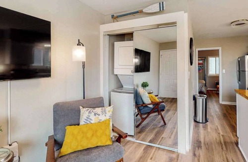 Caine Woods Condo | Dog-friendly condo near beach with updated interior & private W/D