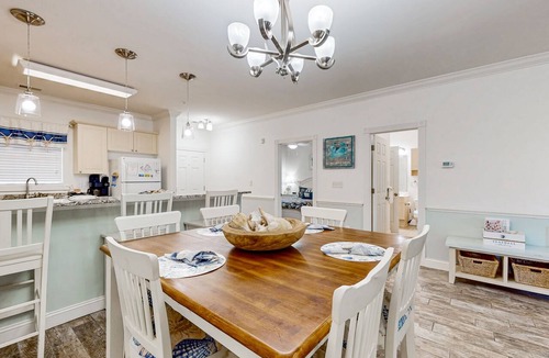 Central Myrtle Beach Condo | Dual-suite Magnolia Pointe condo with golf, pools, and screened patio