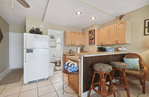 Bay Esplanade Apartment | Enchanted Inn Suite #6: Waterfront, Pool, Fishing Dock, Boat Docks & Tiki Bar!