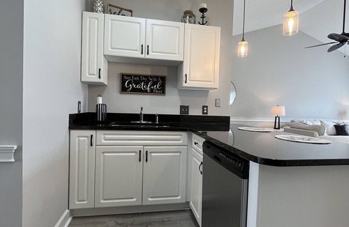 Central Myrtle Beach Condo | Endless Summer Updated Condo at Magnolia Place - Pool & Golf Course Views!