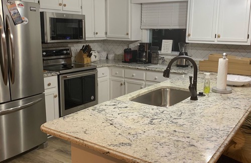 Ash House | Escape to this stunning oceanfront vacation home in Sunset Beach, NC.