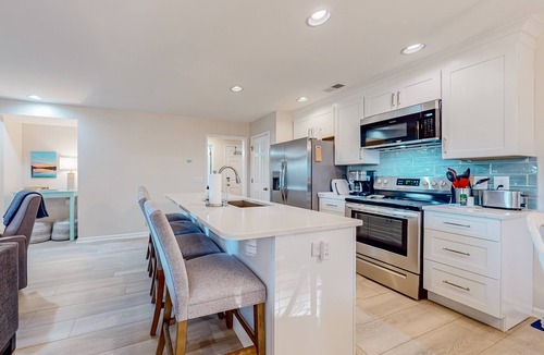 Sea Trail Condo | Ev's Escape: Sunroom, dog-friendly