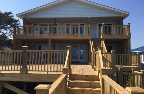 Holden Beach House | Experience coastal living at Dune Deck South, a beautiful 4-bedroom duplex in Holden Beach.