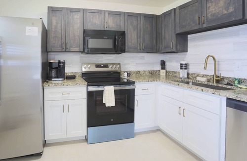 Treasure Island Condo | Family Reunion, Weddings, Group Celebrations - Beach Access, Near Dock & Kayak Launch + BBQ & Patios