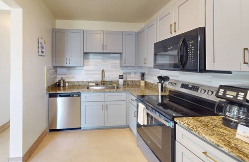 Treasure Island Condo | Family Reunion, Weddings, Group Celebrations - Beach Access, Near Dock & Kayak Launch + BBQ & Patios