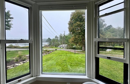 Isle of Springs House | Gracious 4-bedroom house in Southport on Townsend Gut with a private pond.